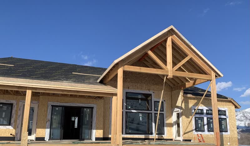 Timber-Truss Entry — Custom home detail